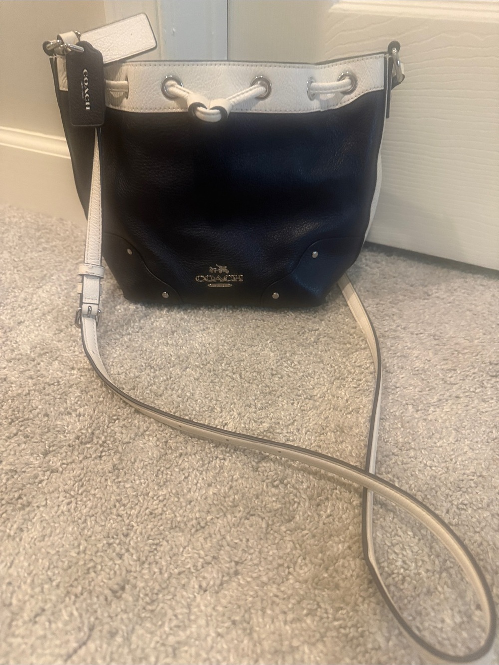 Coach Black Pebbled Leather Drawstring Shoulder Bag with Cream Trim